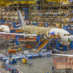 To avoid strike, Boeing promises 25% pay hike—and to build next jet in Seattle