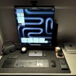 Developer with dual Mac minis goes from 4 displays to 1 weird one [Setups]